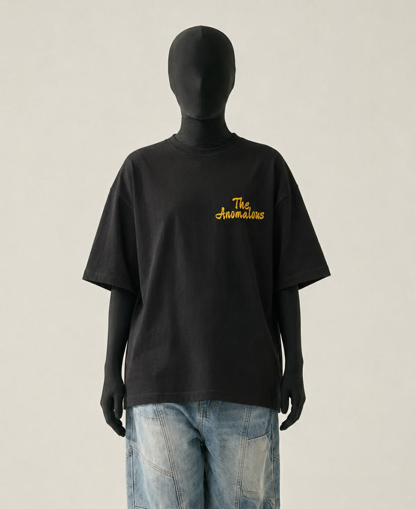 Mannequin wearing a black t-shirt with yellow text and blue jeans on a white background