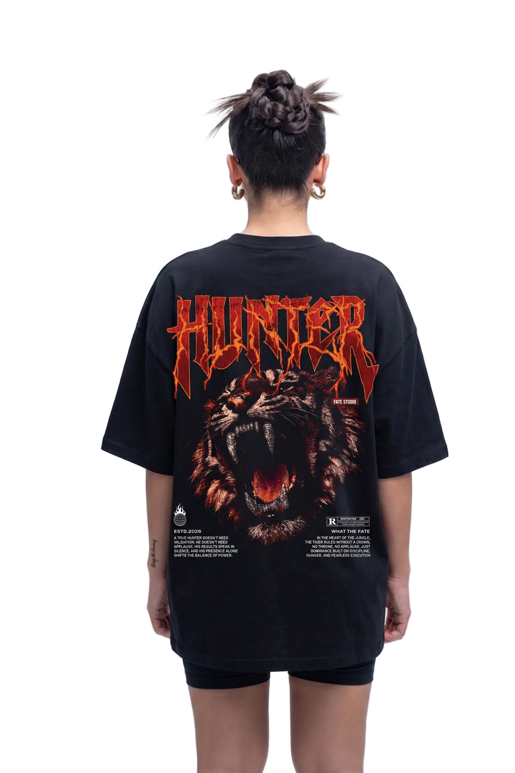 Person wearing a black t-shirt with a graphic design and 'HUNTER' text on the back, against a white background.