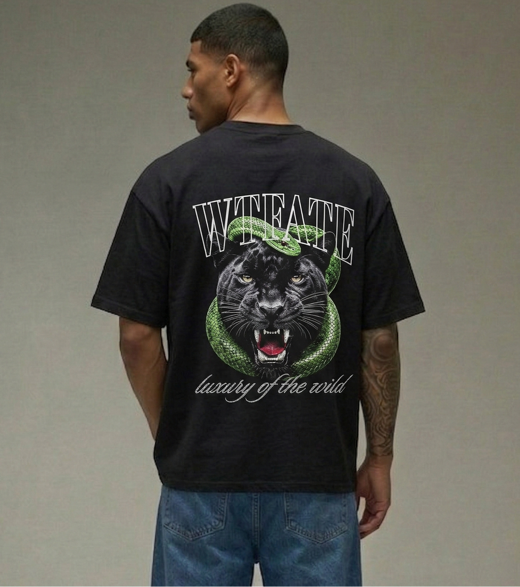 Person wearing a black t-shirt with a panther graphic and text on the back, standing against a plain background.