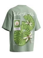 Green t-shirt with nature-themed design and text on a white background