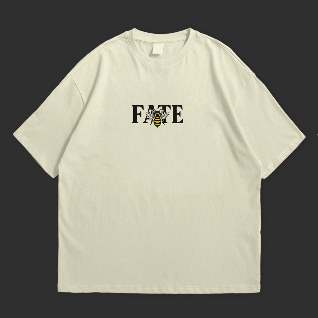 Bee Fate oversized T-shirt in light color featuring bold text and graphic design