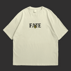 Bee Fate oversized T-shirt in light color featuring bold text and graphic design