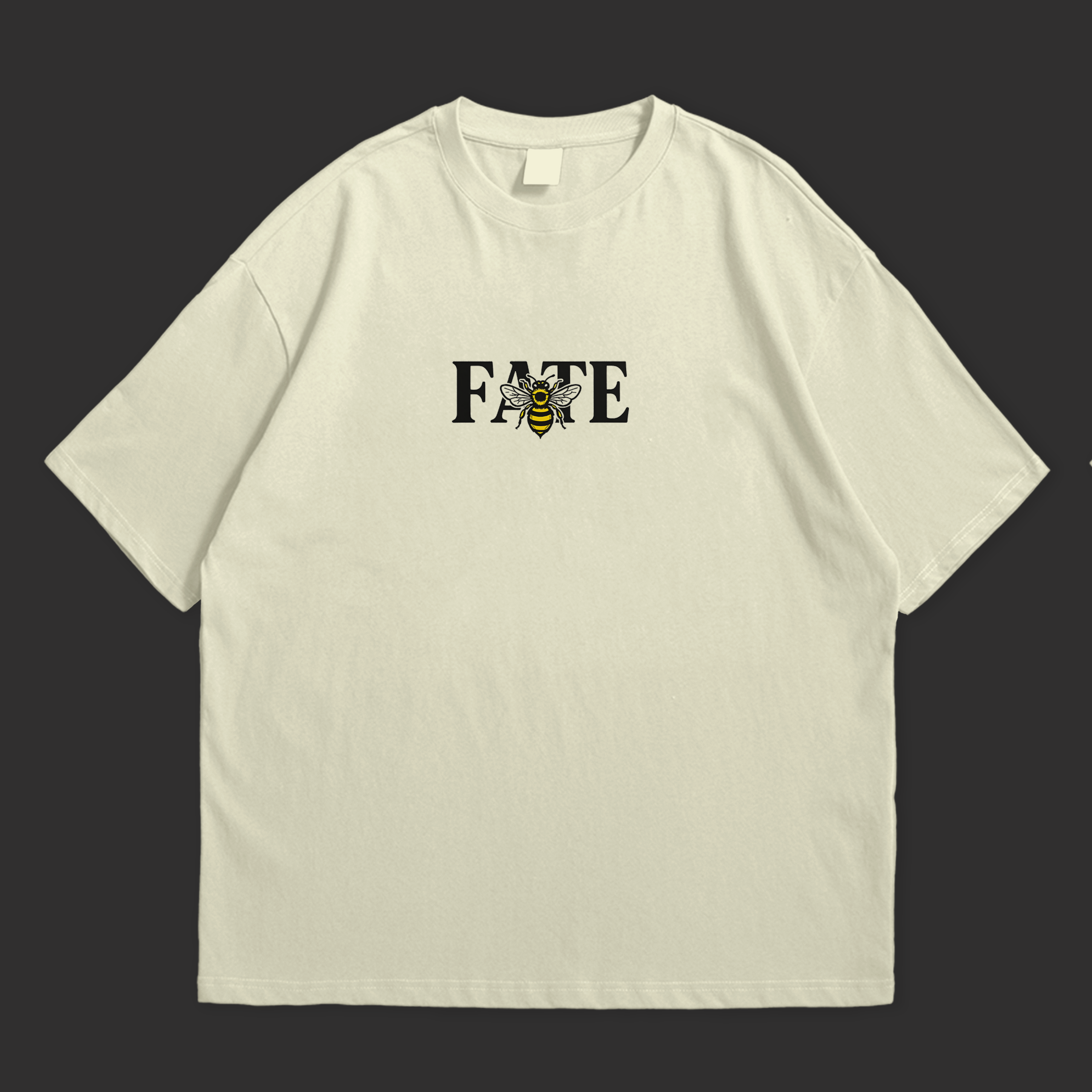 Bee Fate oversized T-shirt in light color featuring bold text and graphic design