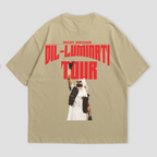 Back view of oversized black T-shirt by WHAT THE FATE with "Dil-Luminati Tour" graphic, showcasing a Diljit Dosanjh image. Perfect for music lovers and Diljit fans looking for unique tour merchandise and casual wear.