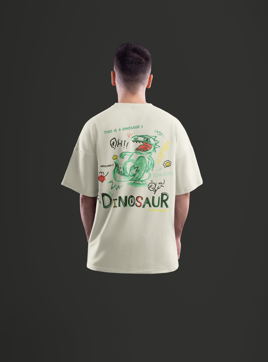 Person wearing a beige t-shirt with a colorful dinosaur graphic on the back against a black background