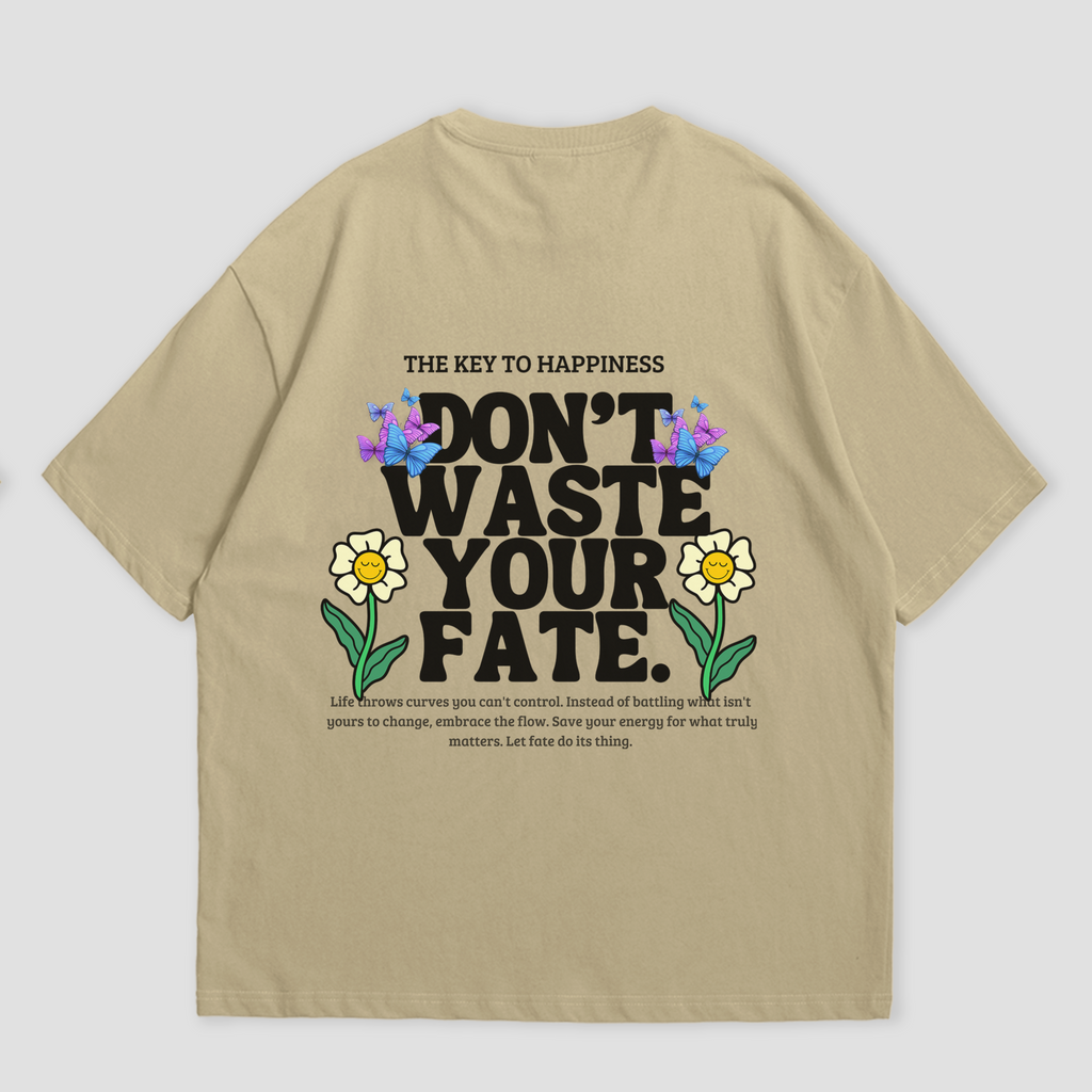 WHAT THE FATE Don't Waste Your Fate oversized t-shirt in black, with 'The Key to Happiness' text on the front and motivational message with flowers and butterflies on the back, 240 GSM terry cotton