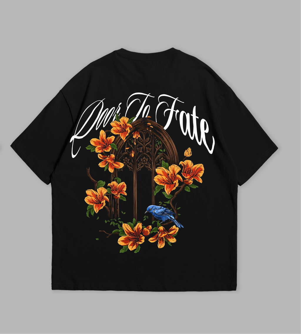 Black t-shirt with floral design and text on front and back against a gray background