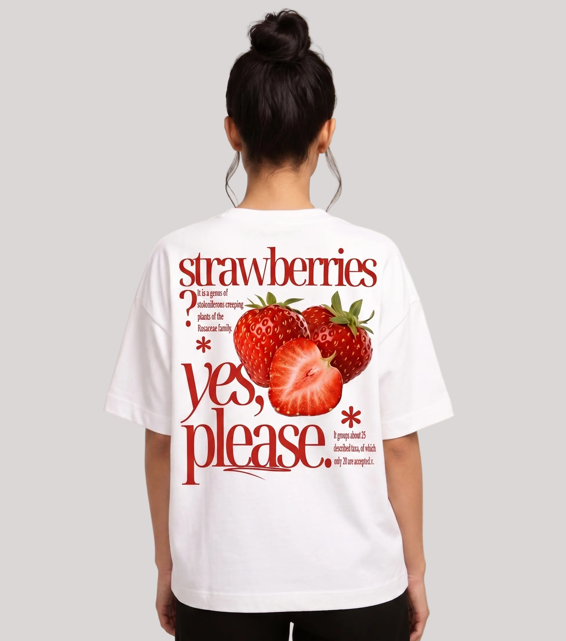 Oversized graphic tee clothing featuring a vibrant strawberry design and playful text on the back