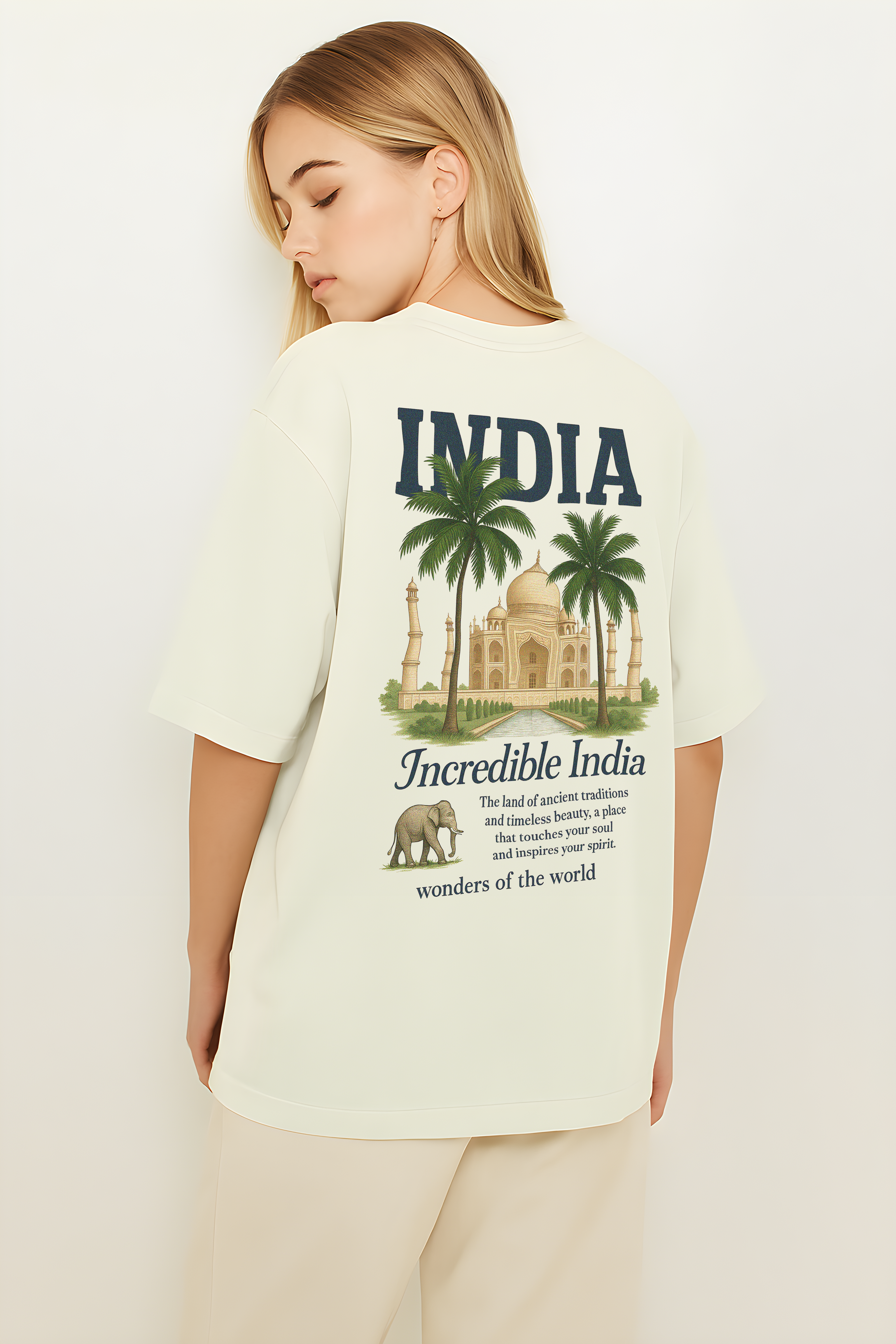 Incredible India oversized t-shirt featuring a Taj Mahal graphic and palm trees on the back