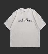 Two white t-shirts with a bonsai tree design and text on a black background