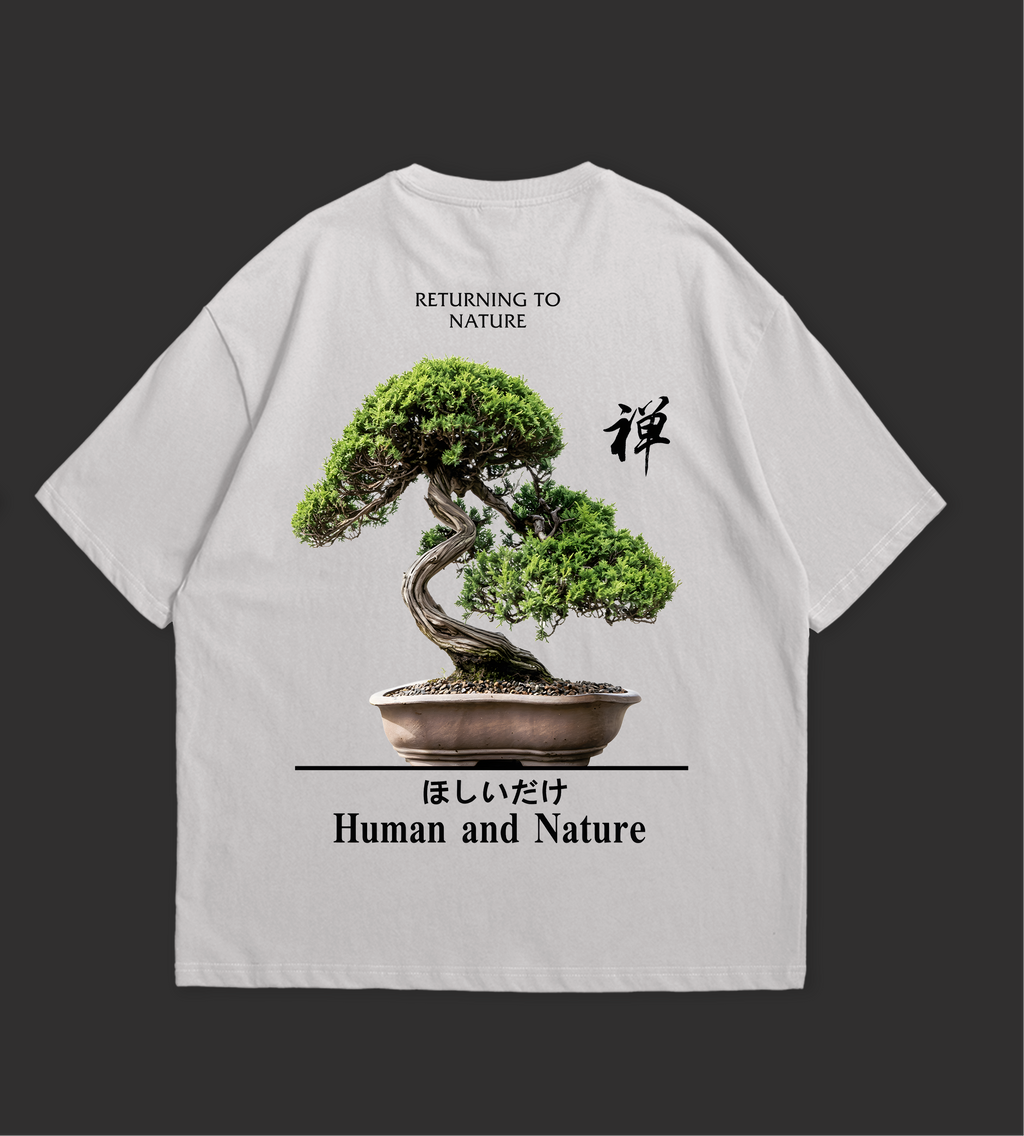 Two white t-shirts with a bonsai tree design and text on a black background