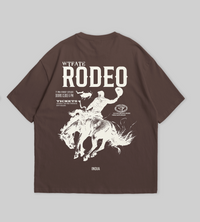 Brown t-shirt with white graphic design on a gray background