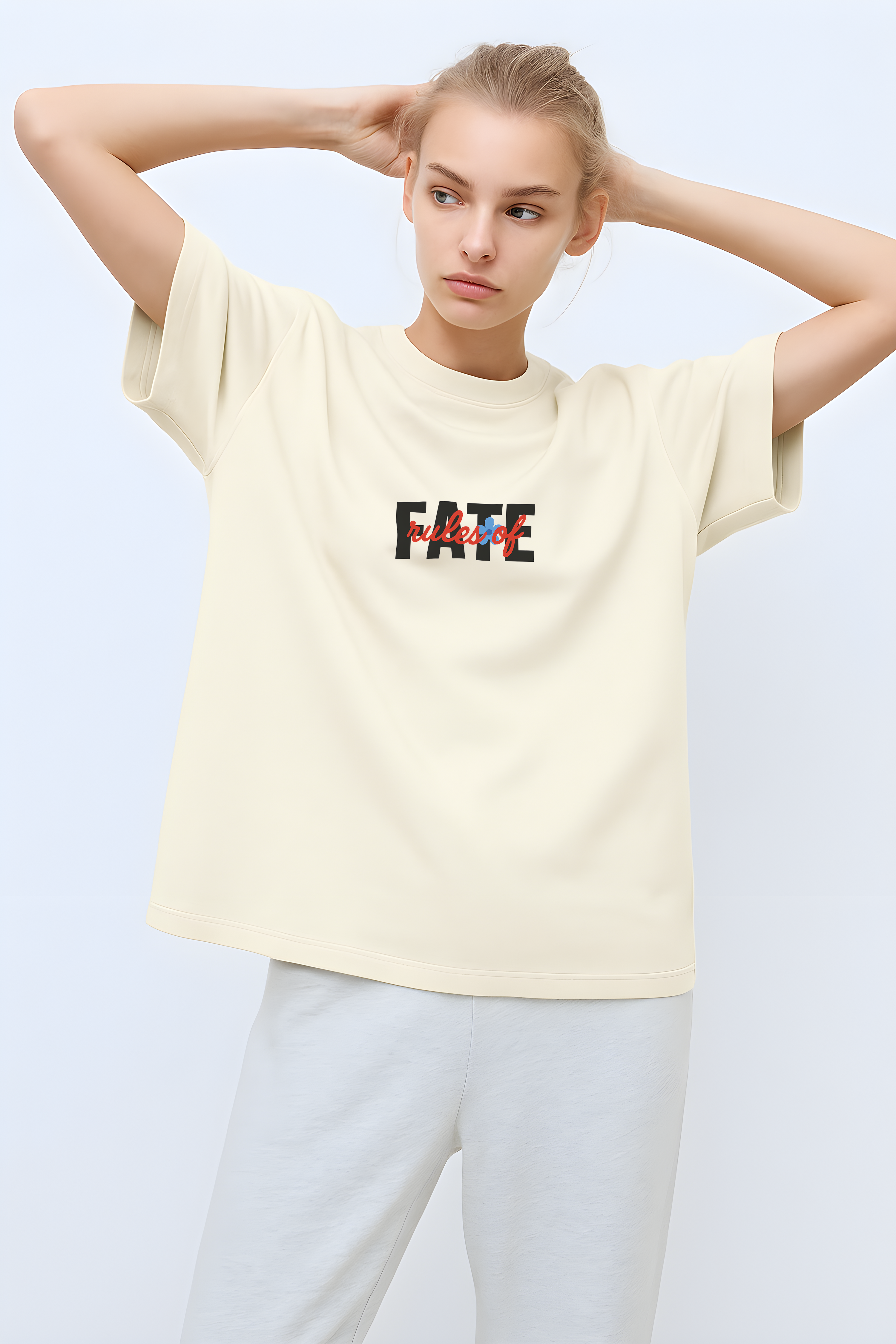 Rules of Fate Oversized T-Shirt in soft cream color, featuring a bold graphic design on the front