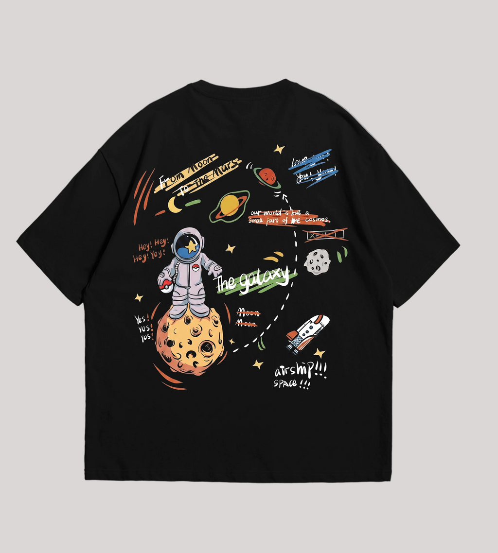 Black t-shirt with space-themed graphics on a gray background