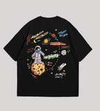 Black t-shirt with space-themed graphics on a gray background