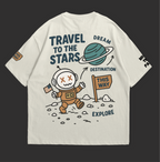 Travel to the Stars Oversized t-shirt featuring a cute astronaut and playful space graphics