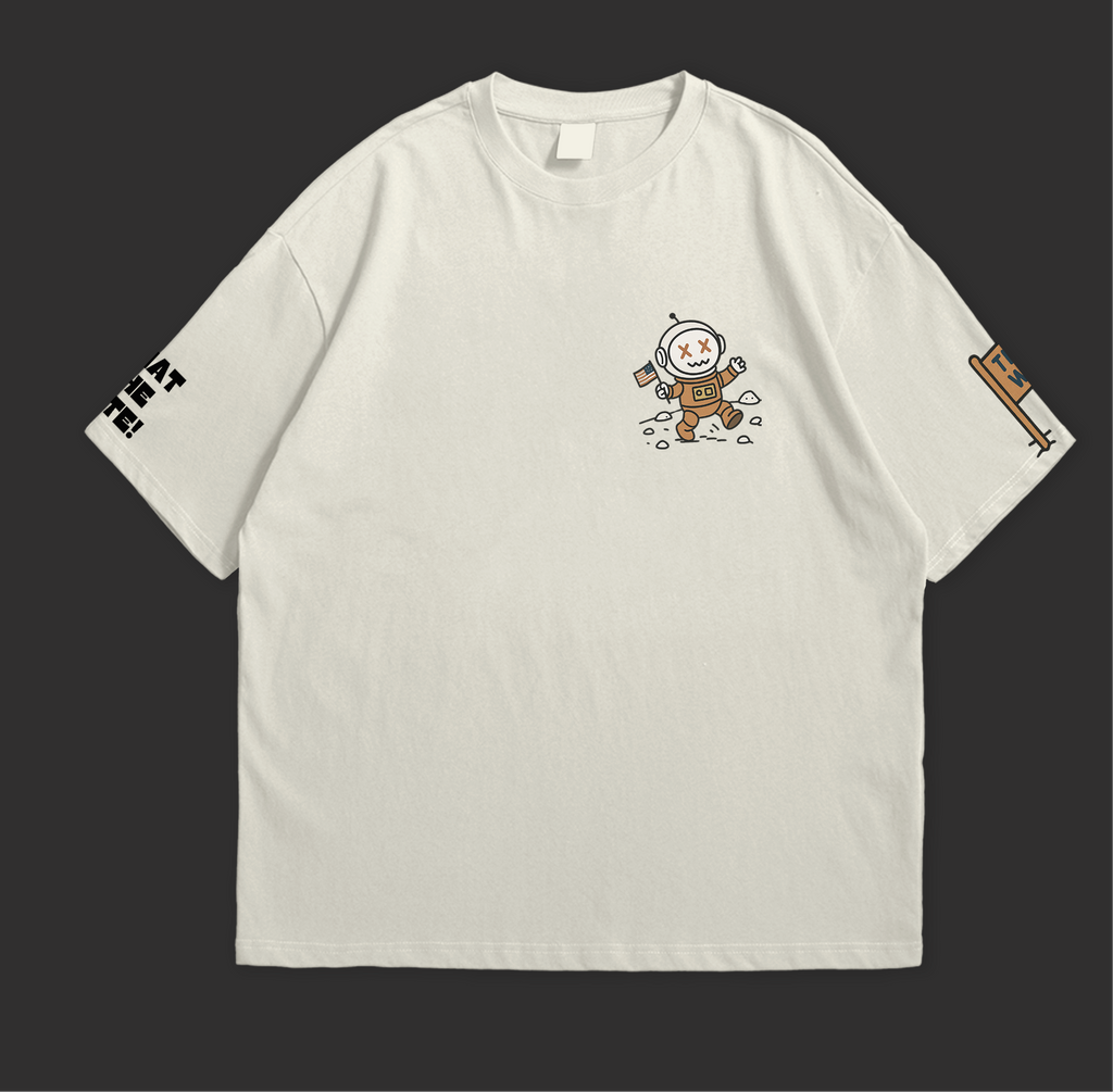 WHAT THE FATE Travel to the Stars Oversized t-shirt with astronaut design on a light background