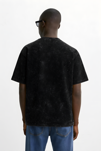Back view of a vintage Nirvana oversized shirt with a soft, worn texture and relaxed fit