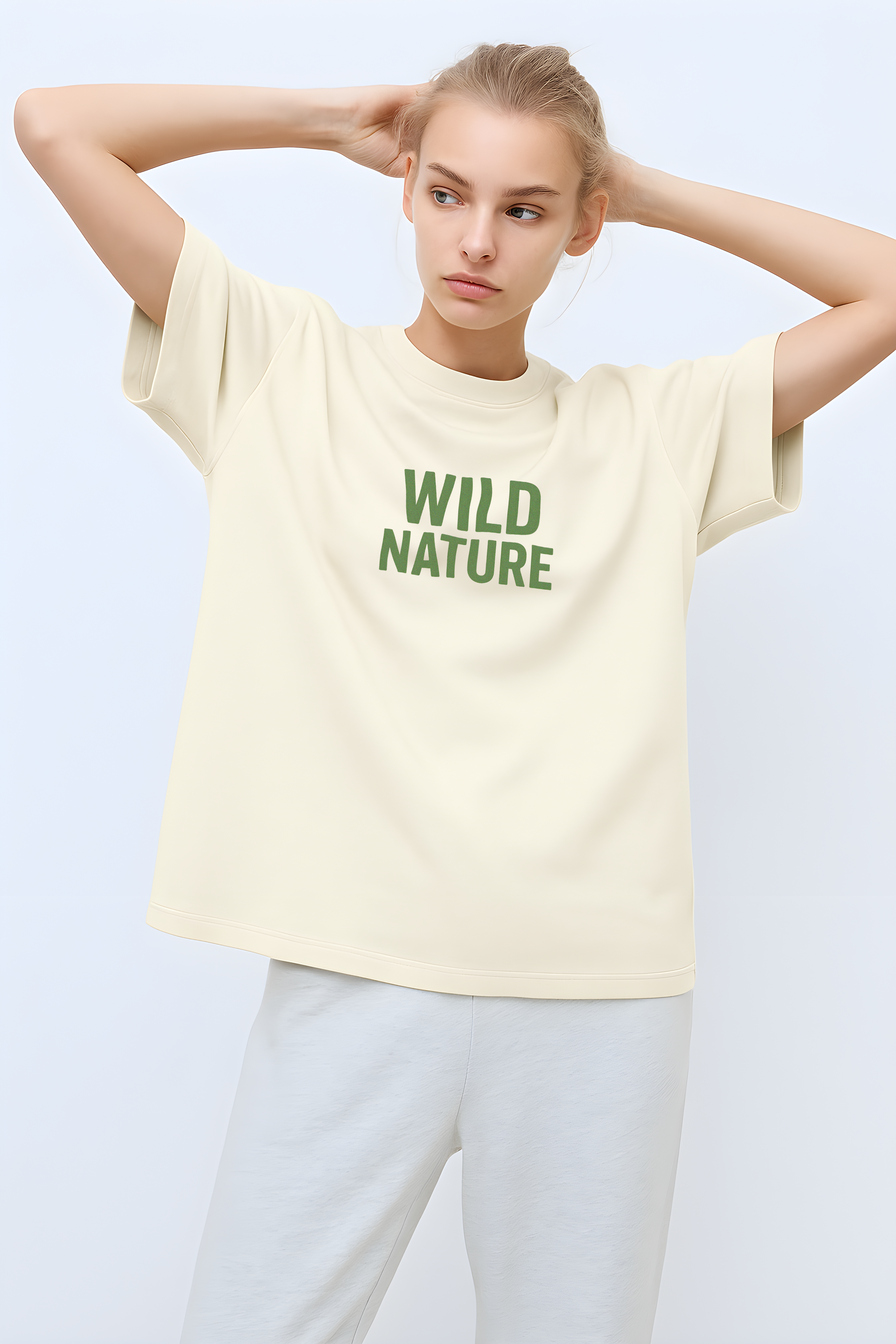 Wild Nature Oversized T-Shirt in light beige with green graphic text for a casual look