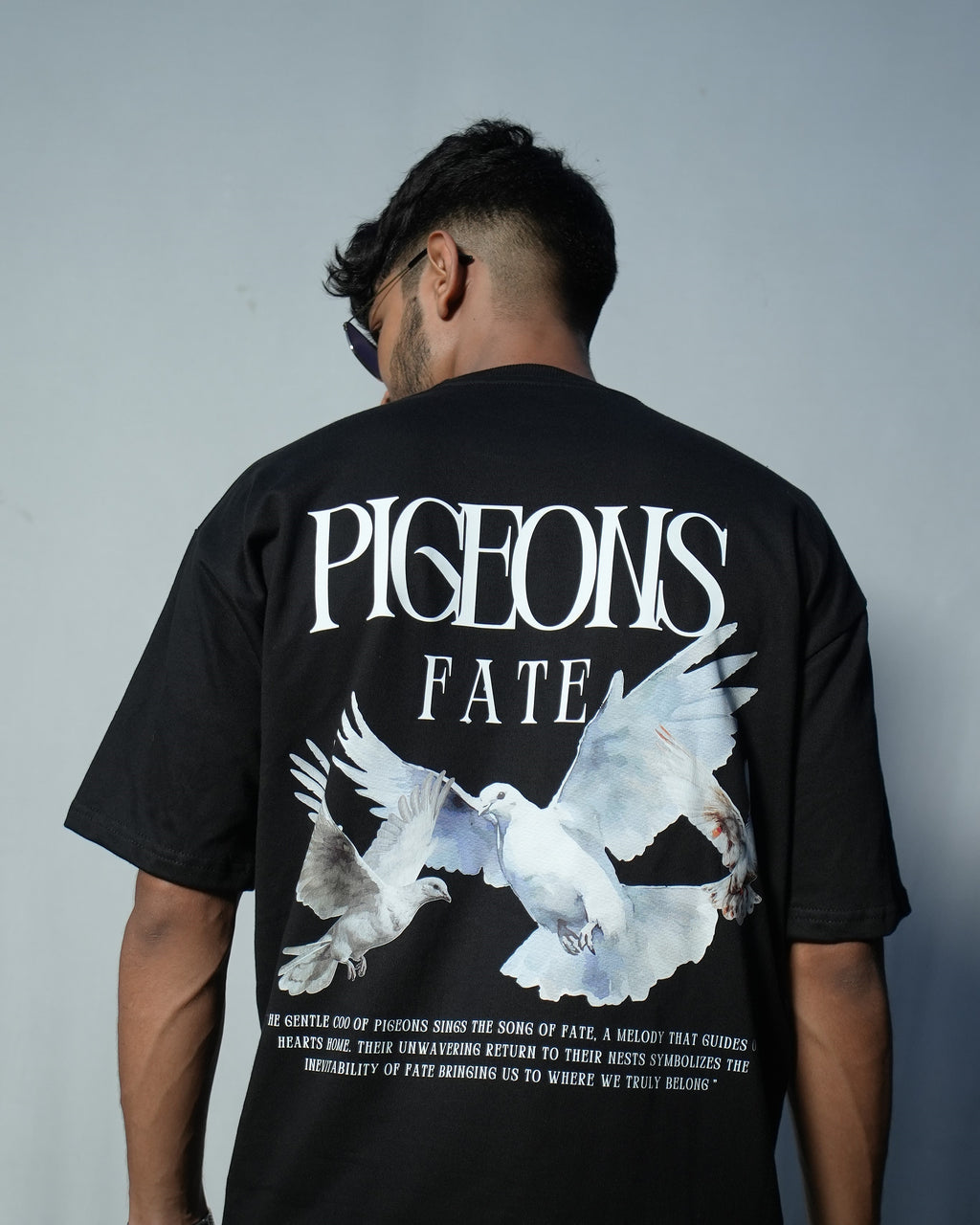 Pigeons of Fate cotton tee featuring bold graphic print of white pigeons on a black background