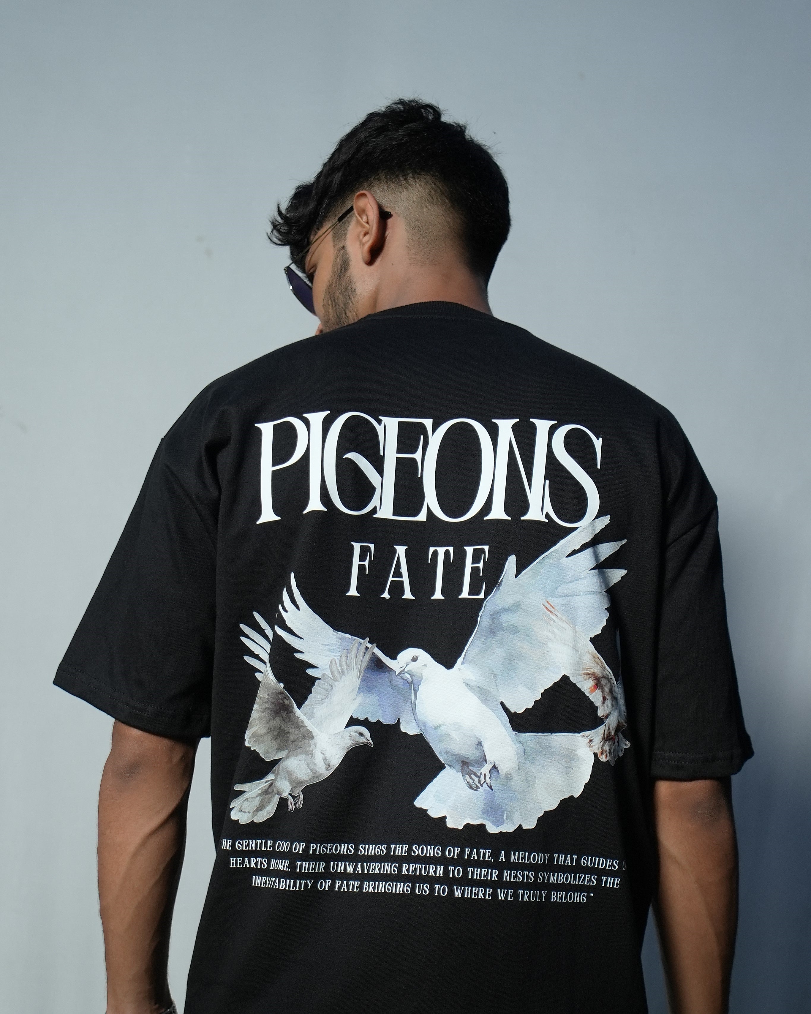 Pigeons of Fate cotton tee featuring bold graphic print of white pigeons on a black background